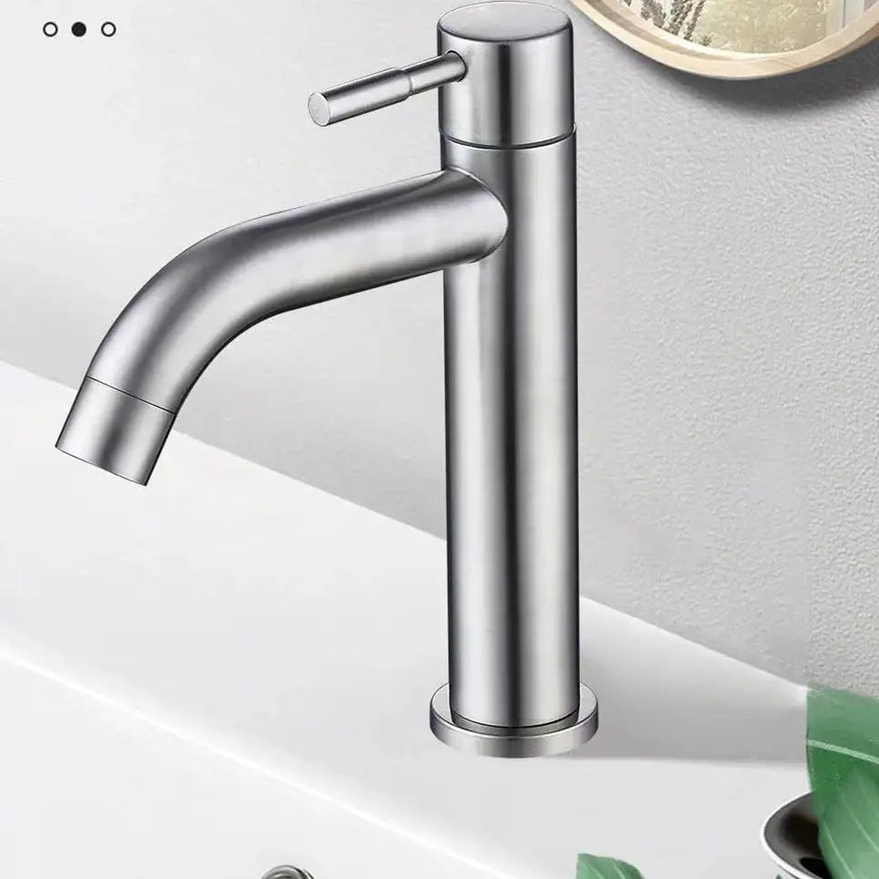 Simples Market stainless steel basin faucet; deck-mounted single-handle sink tap with tall cylindrical body and curved spout.