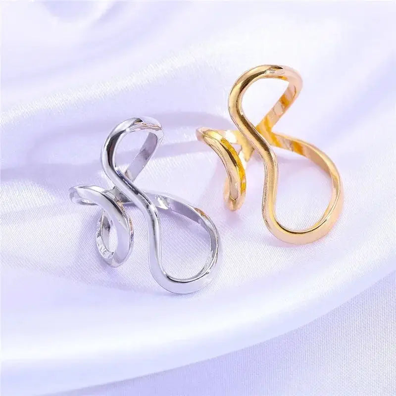 Pair of irregular stainless steel rings in silver and gold color, unisex party jewelry
