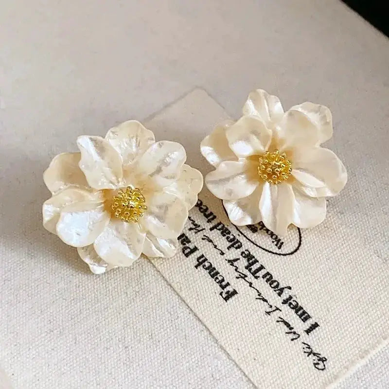 Enamel flower earrings, white petals with gold centers, pair