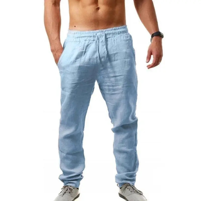 Men's linen wide-leg pants in light blue with elastic waistband; casual streetwear style.