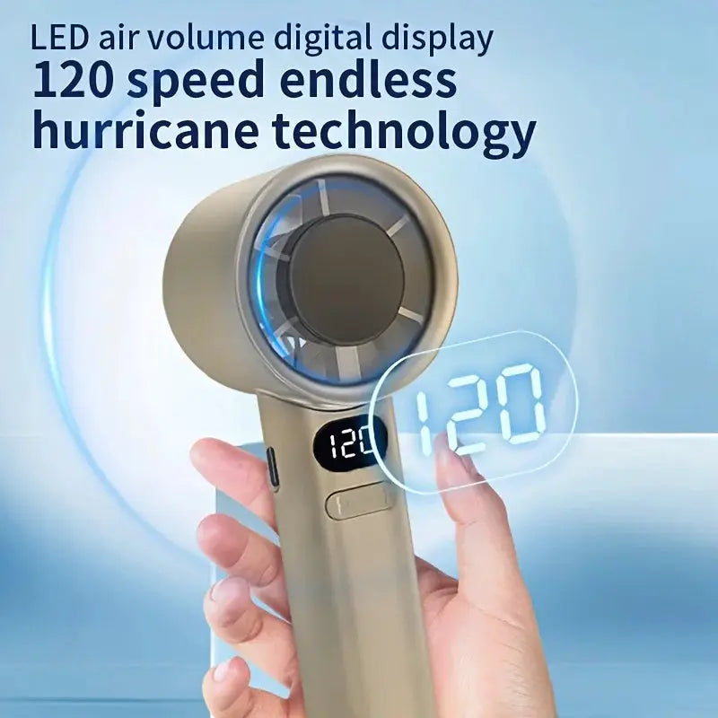 Handheld mini fan by Simples Market with beige body and LED digital display