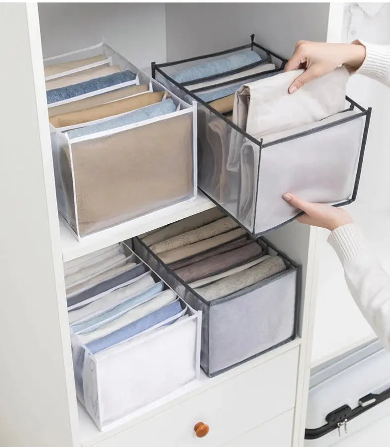 Organizer storage boxes by Simples Market; white/gray fabric with mesh panels for underwear and socks