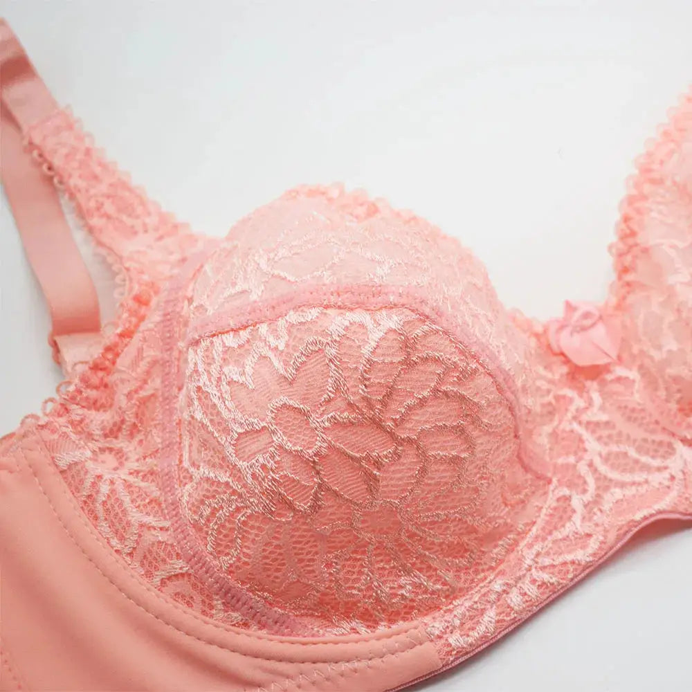 Plus-size pink lace underwire bra with floral pattern