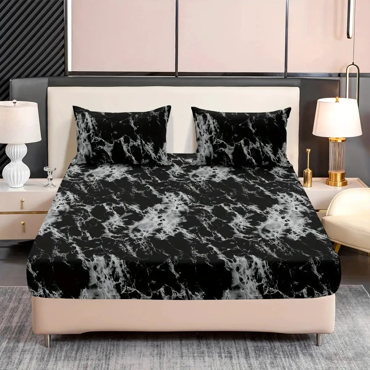 3-Piece marble print fitted sheet set on bed; includes pillowcases, black marble pattern, ultra-soft microfiber fabric