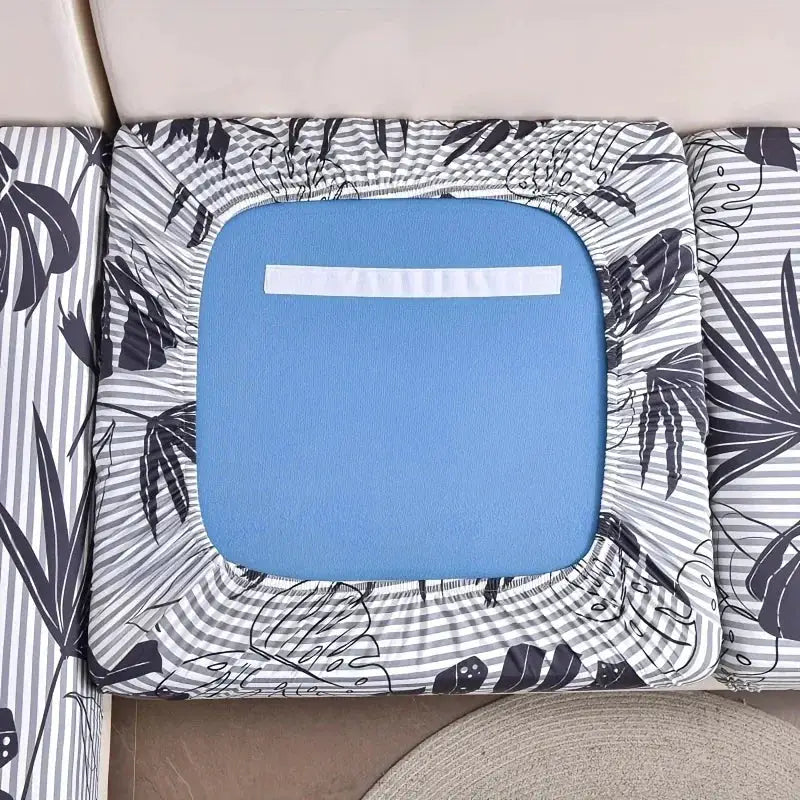 Elastic sofa seat cushion cover for L-shaped corner couch; floral black-and-white print with blue insert
