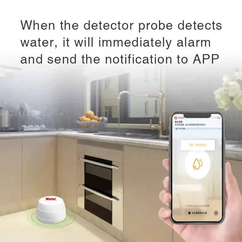 Tuya WiFi water leak detector in white with red label, shown with a smartphone displaying a flood alert in a kitchen