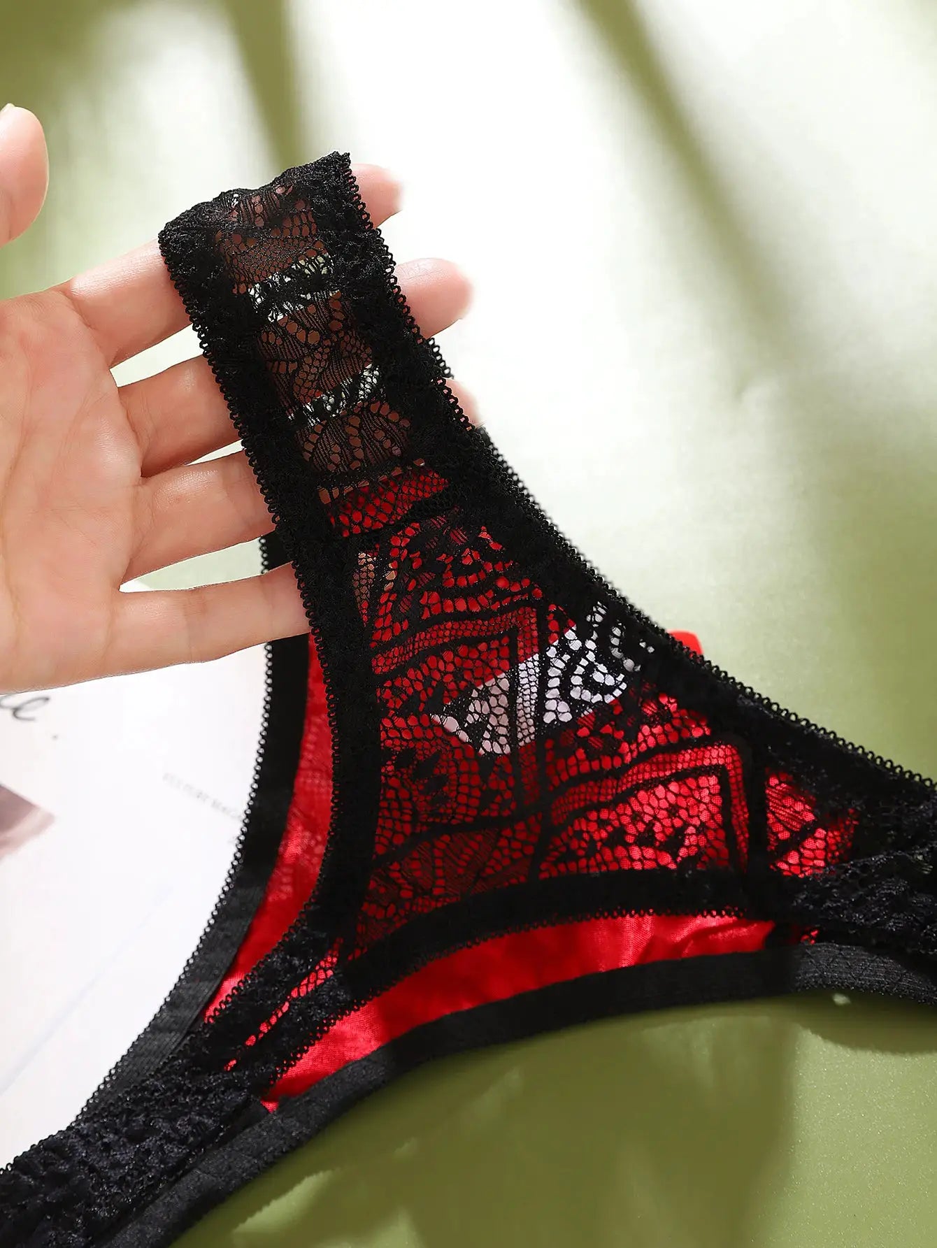 G-string panties by Simples Market, color-block black lace over red satin, sheer mid-low rise