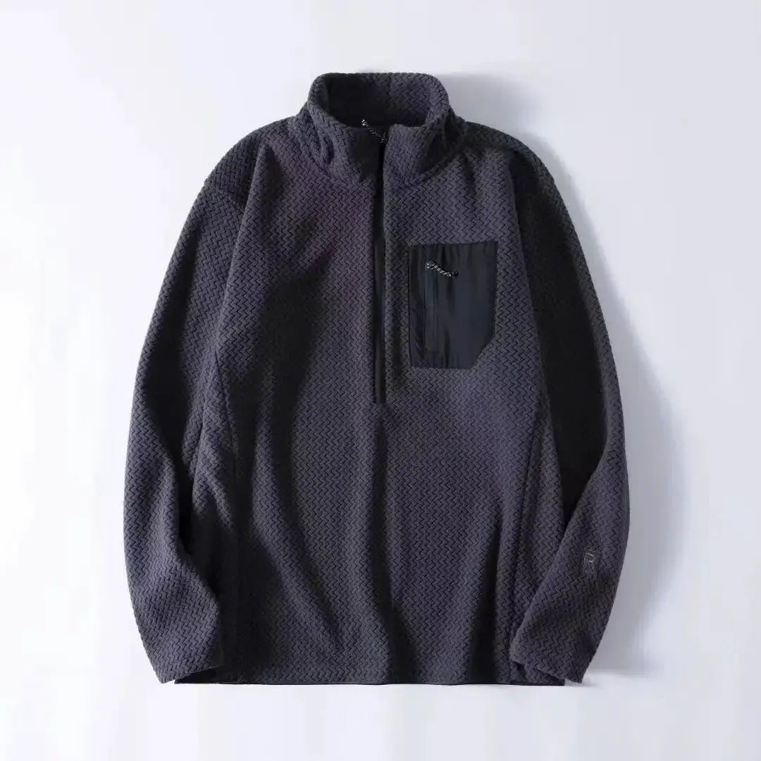 Fleece sweatshirt, dark gray with wavy texture, half-zip front and zip chest pocket, long sleeves