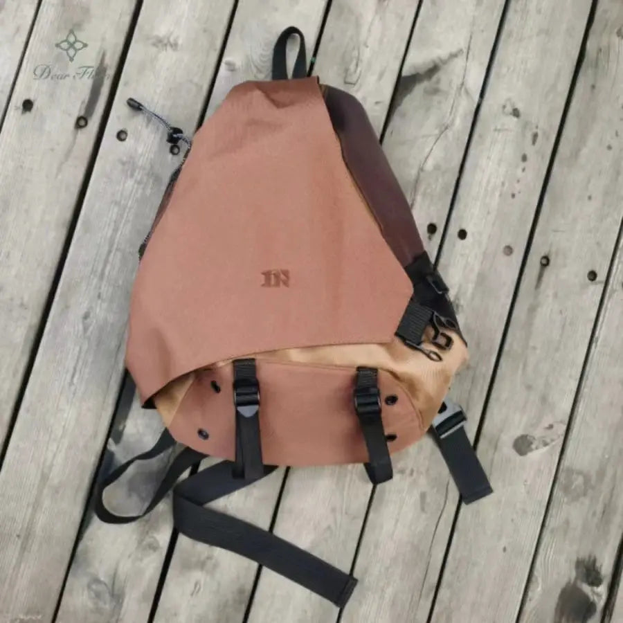 Y2k nylon crossbody bag with tan panels, lightweight unisex travel knapsack