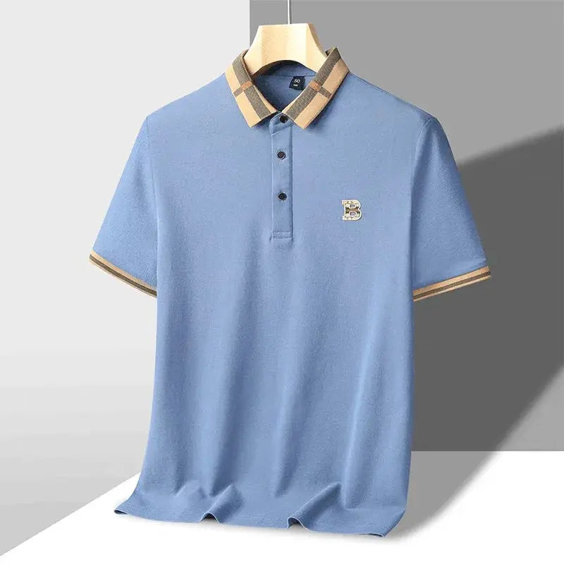 Men's polo shirt in light blue silk-cotton blend with beige-brown striped collar and cuffs, embroidered B logo.
