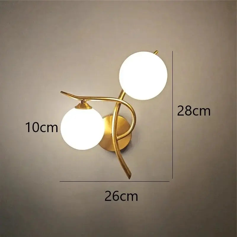 Simples Market Nordic iron wall lamp with two glass globes, brass finish, LED G9.