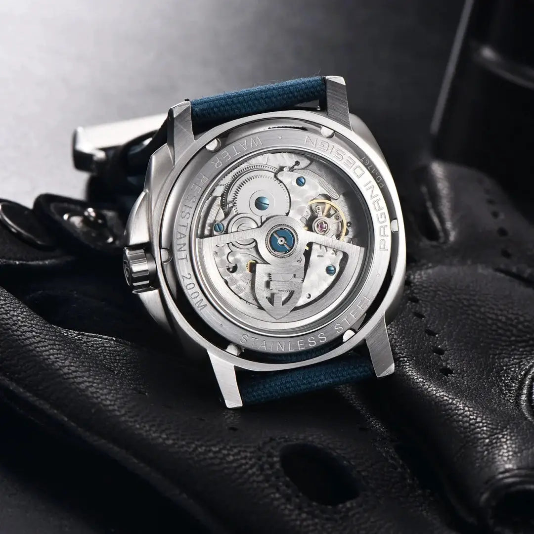 PAGANI Design men's automatic watch with stainless steel case, blue strap, transparent case back, 200m water resistant