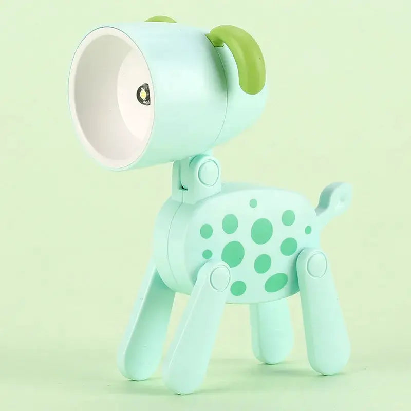 Mint-green animal-shaped mini LED night light with folding desk lamp, adjustable head and polka-dot body.