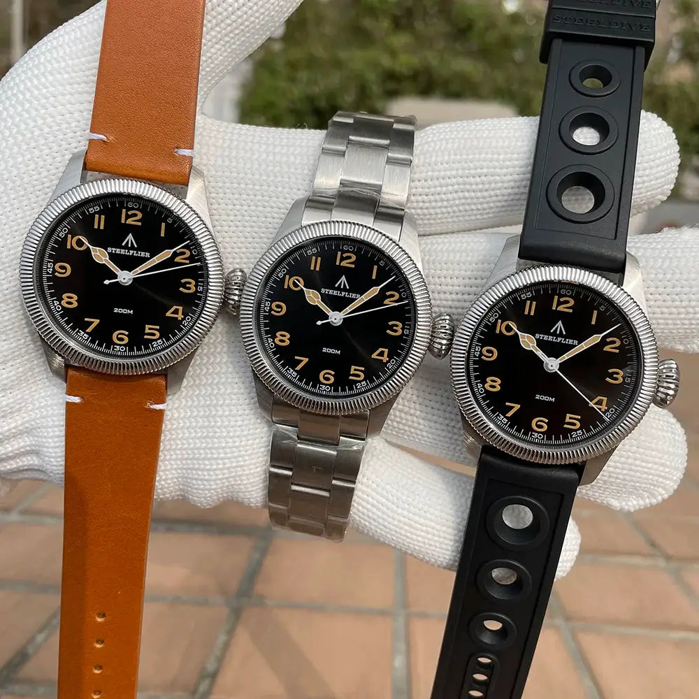 Steelflier SF741 quartz wristwatch set of 3 with leather, stainless steel bracelet, and rubber straps