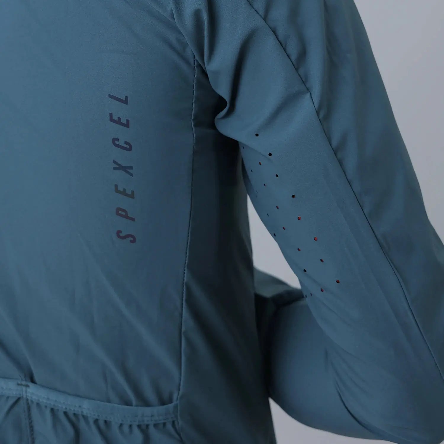 SPEXCEL blue windproof cycling jacket with stretch fabric and 3 back pockets