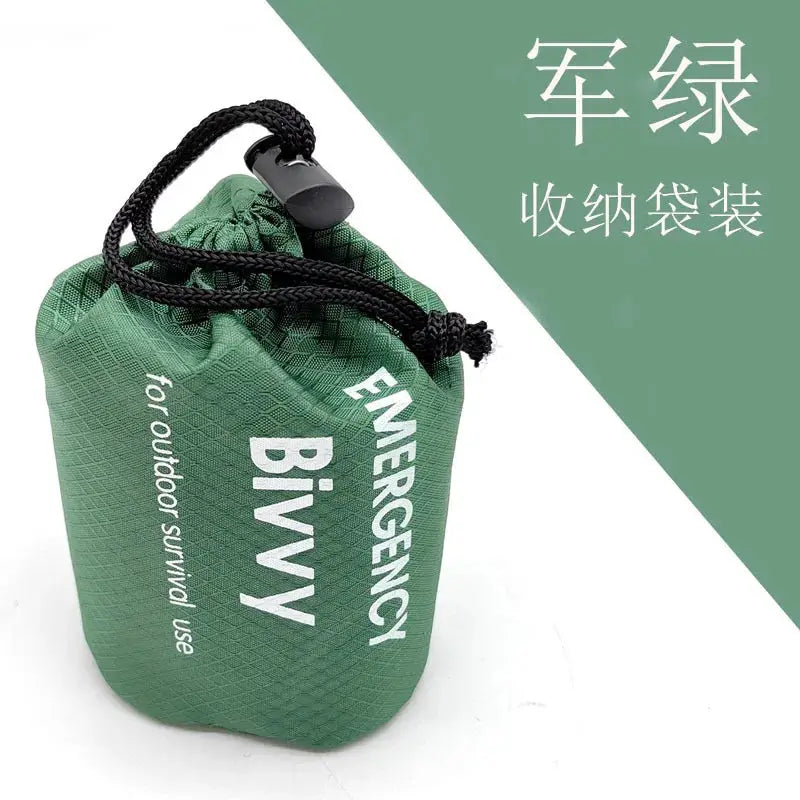 Green emergency bivy bag for outdoor survival; lightweight, waterproof Mylar shelter with drawstring closure