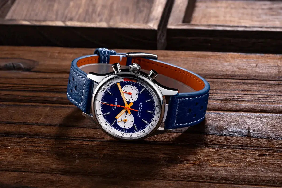 Sugess men's chronograph watch with blue dial, orange hands, white subdials and blue leather strap