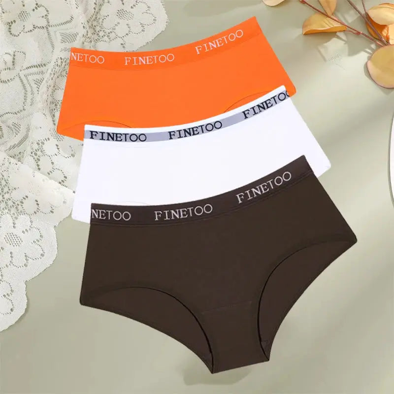 3-piece FINETOO cotton underwear set in orange, white and brown with breathable low-rise briefs for women
