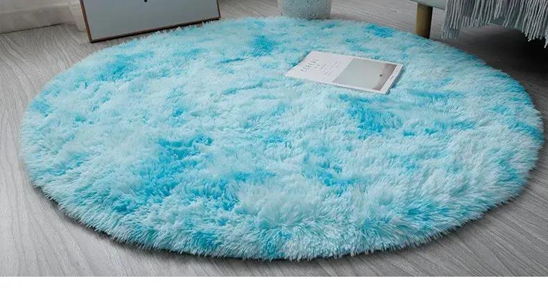 Round plush rug by Simples Market; light blue fluffy thick-pile mat for living room or kids’ room decor