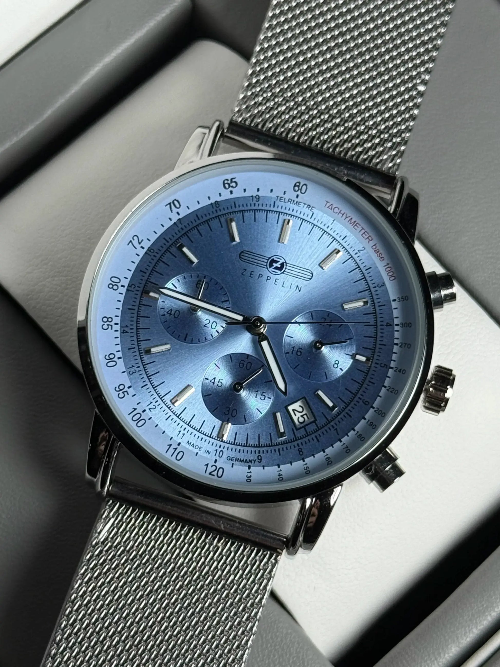 Zeppelin Airship automatic men's watch with blue dial and stainless mesh band.