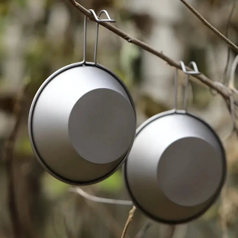 Two Tiartisan Sierra titanium camping bowls, 260ml, ultralight with fixed handles, hanging.