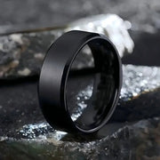 Unisex stainless steel ring with black matte finish, sleek fashion jewelry for men and women.