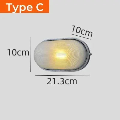 Outdoor retro LED wall lamp with oval glass diffuser and IP65 waterproof rating