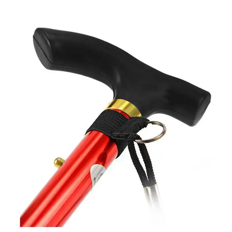 Telescopic red walking stick with black handle, strap, and aluminum alloy shaft