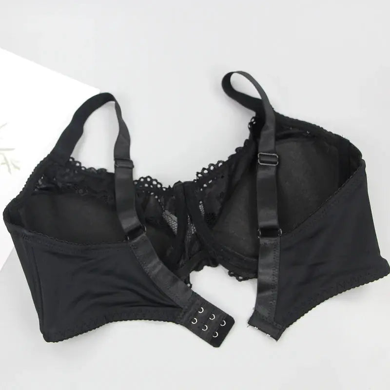 Black lace-trimmed bra with adjustable straps and back hook closures