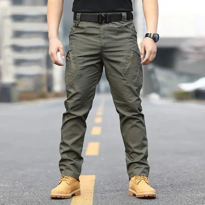 Tactical cargo pants for men olive green with multiple pockets.