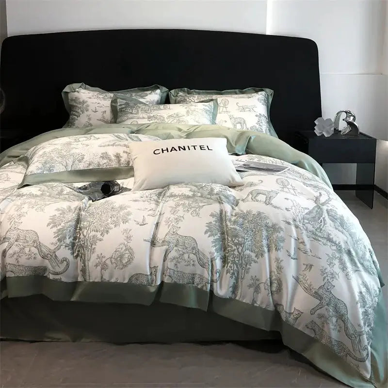Duvet cover set in eucalyptus forest print on Lyocell fabric with sage green trim; CHANITEL pillow label visible.