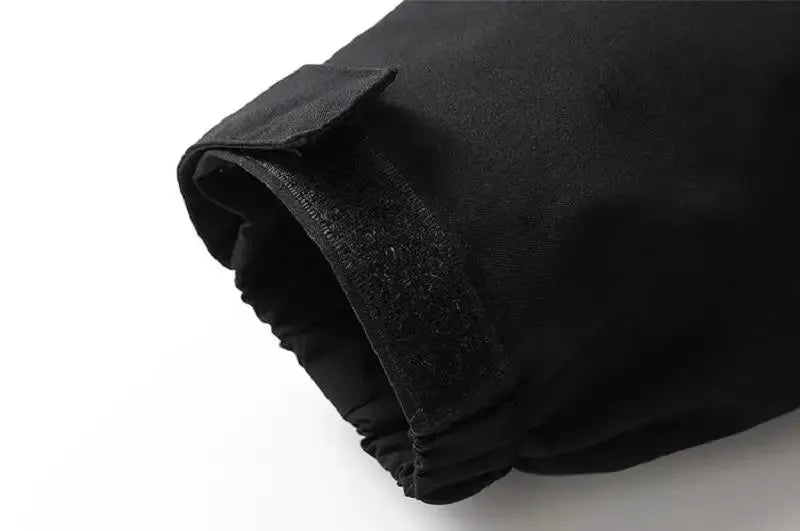 Men's waterproof rain jacket with adjustable Velcro cuff and elastic inner sleeve, black