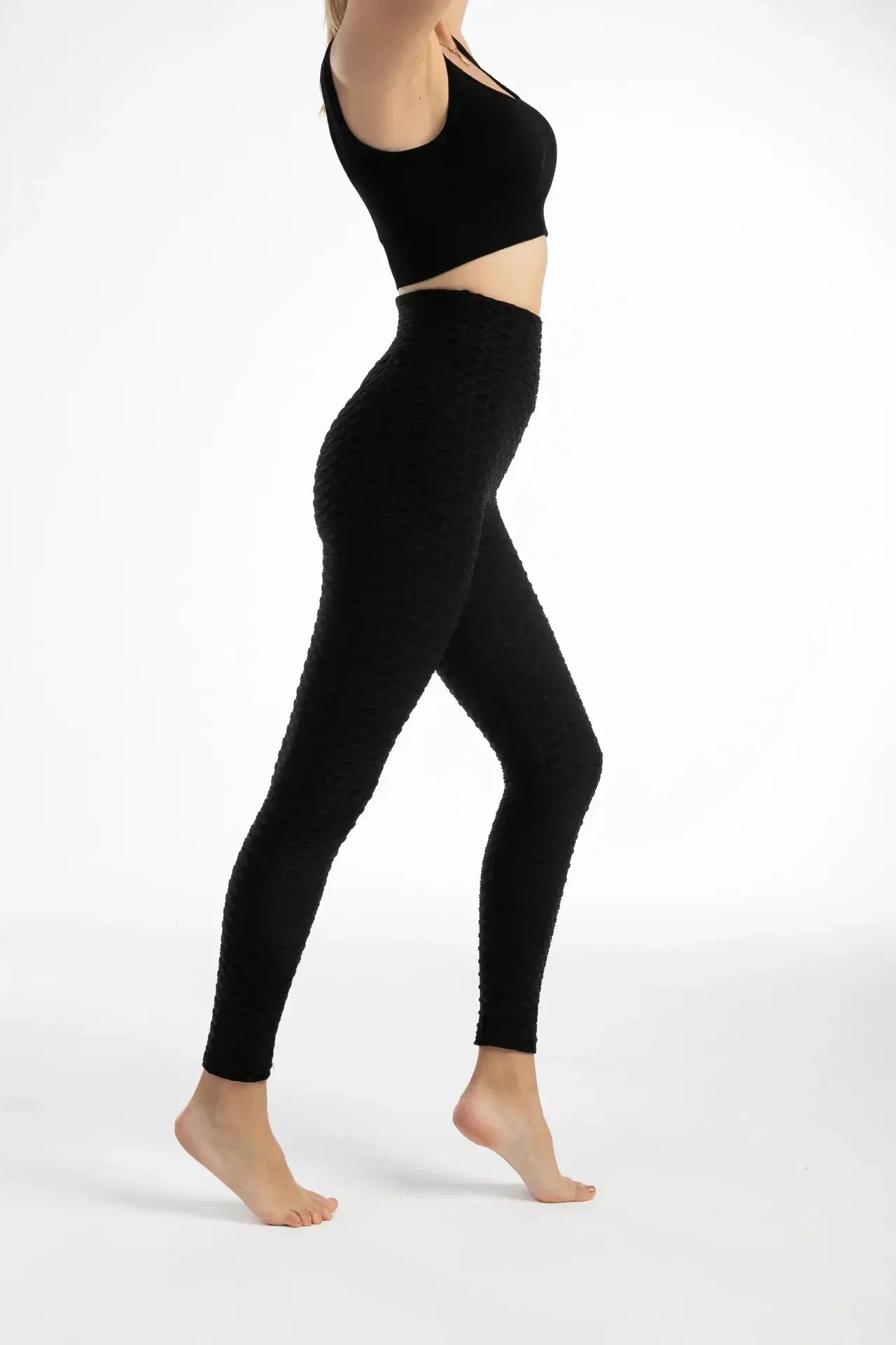 Women's high-waist bubble leggings, seamless black textured yoga pants from Simples Market.