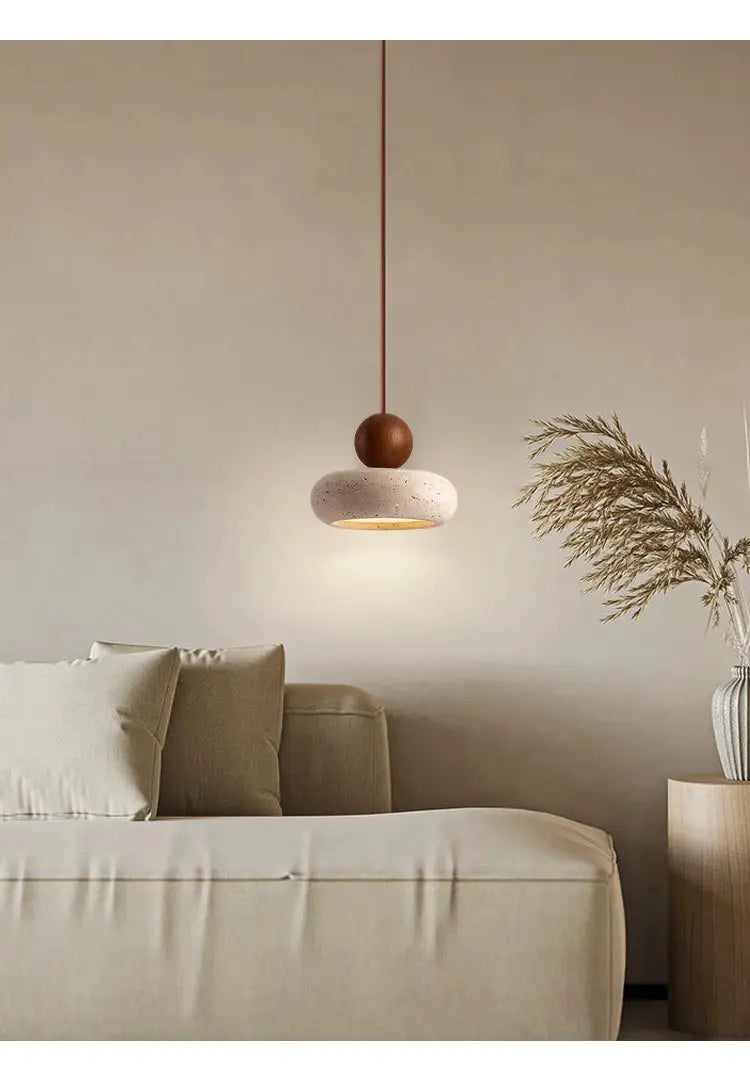 Vintage pendant light with natural yellow agate stone and wooden accent, warm glow.