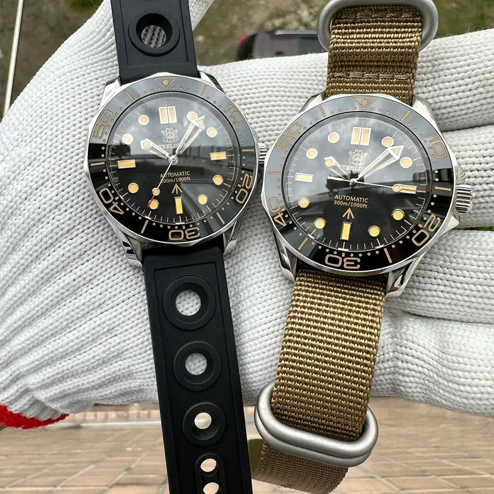 Steeldive SD1957 42mm dive watches pair with black dials and ceramic bezels; rubber left, khaki nylon NATO right.