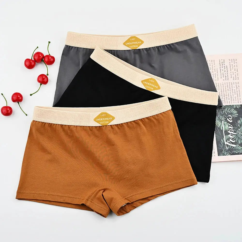 Simples Market 3-pack women's cotton boxer briefs in gray, black, and camel with beige elastic waistbands