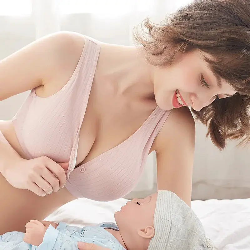Women's pink cotton front-buckle bra, vest-style, traceless comfort.