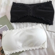 Two strapless lace bandeau bras, black and white ribbed knit with lace trim