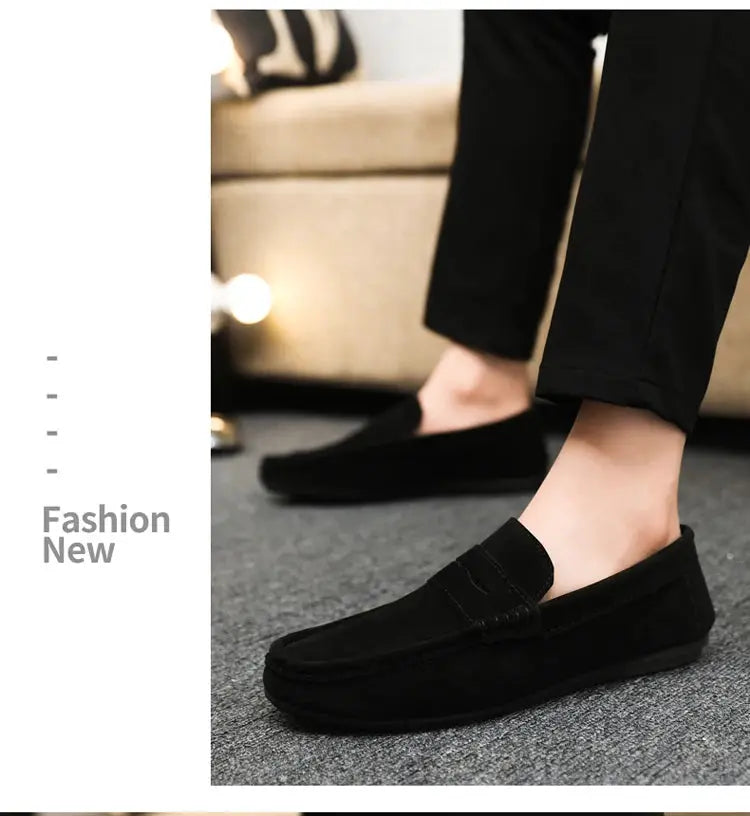 Casual men's driving loafers in black, versatile work shoes shown on model's feet