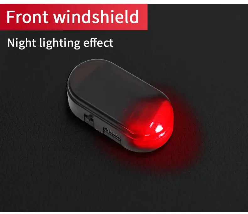 Car security light module by Simples Market in black plastic with red LED glow, simulated wireless warning light