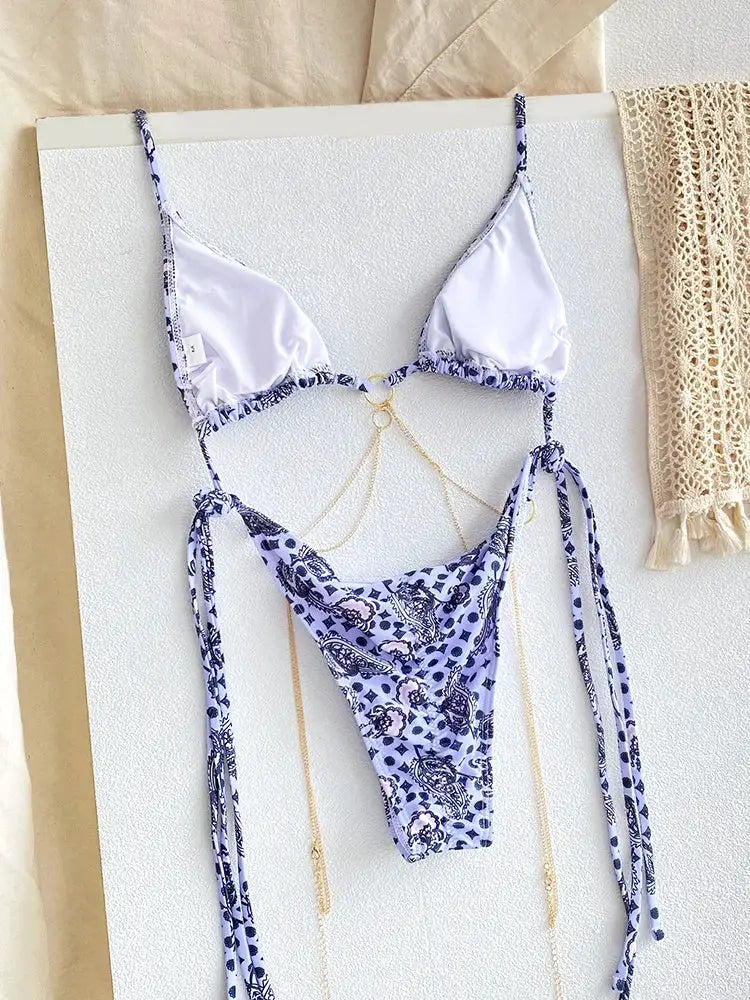 Triangle chain bikini set by Simples Market in lavender floral print with gold chain accents