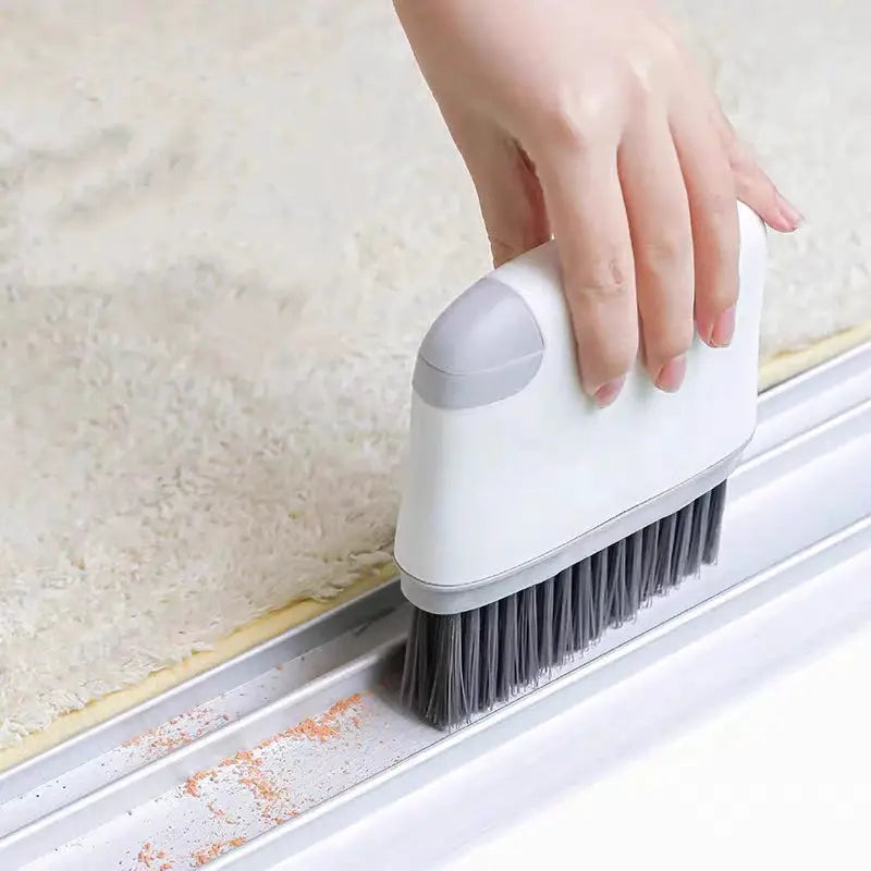 2-in-1 window rail cleaning brush by Simples Market, white body with gray top and dark gray bristles