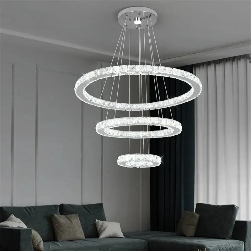 Modern crystal ring LED pendant chandelier with three suspended rings, chrome finish, remote dimming