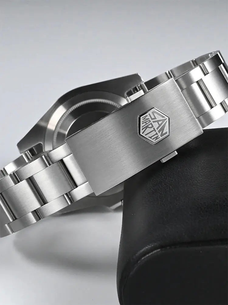 San Martin stainless steel dive watch on a brushed metal bracelet with deployment clasp and SAN MARTIN emblem