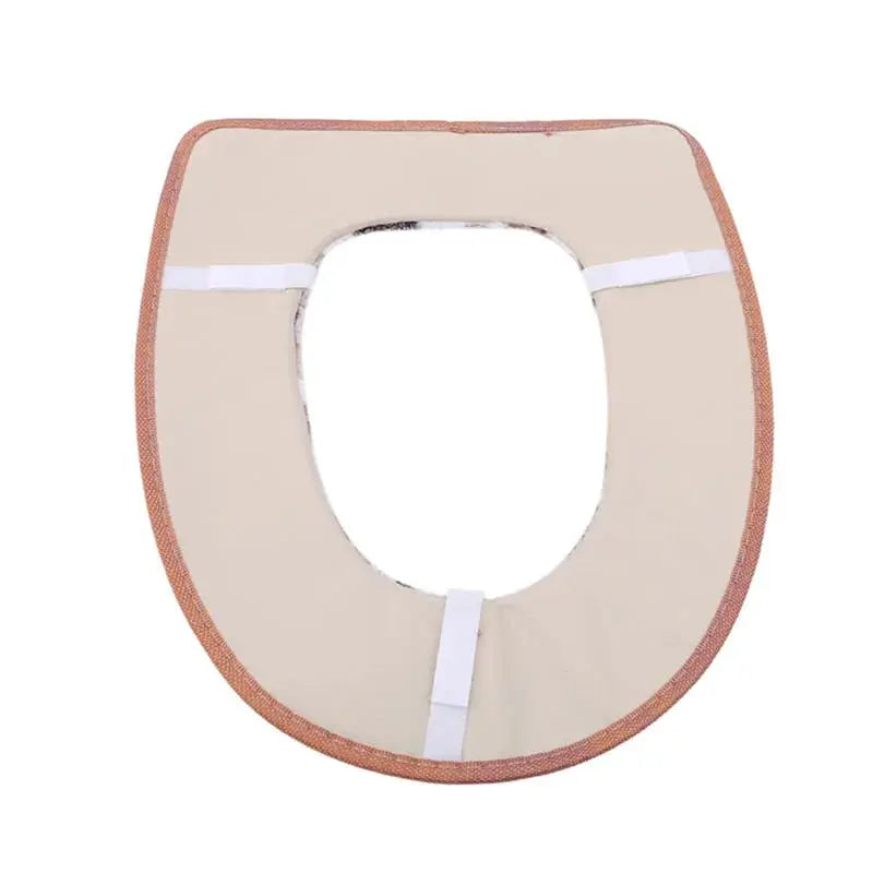 Plush beige toilet seat cover with brown border and white elastic straps; universal, waterproof back-of-seat cushion.