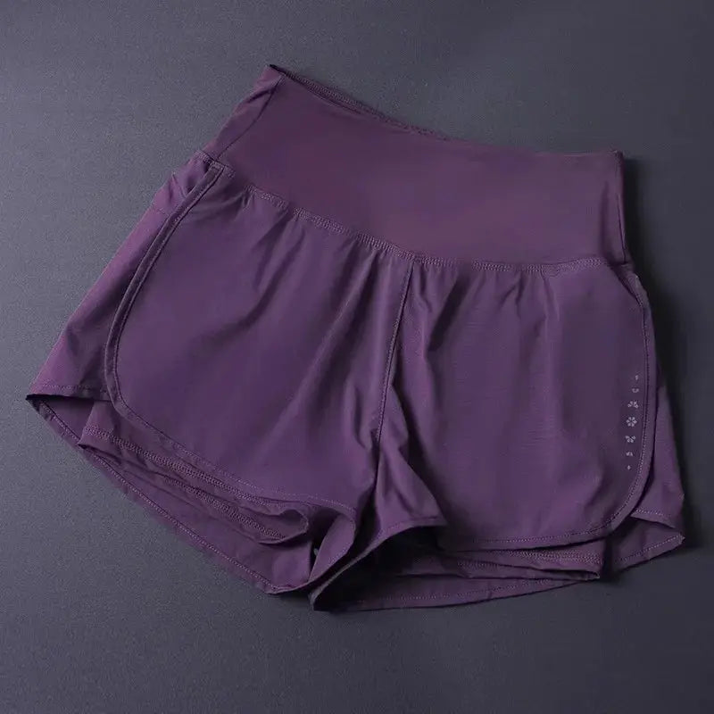 Women's purple 2-in-1 athletic shorts with pockets; lightweight, breathable, split-side design