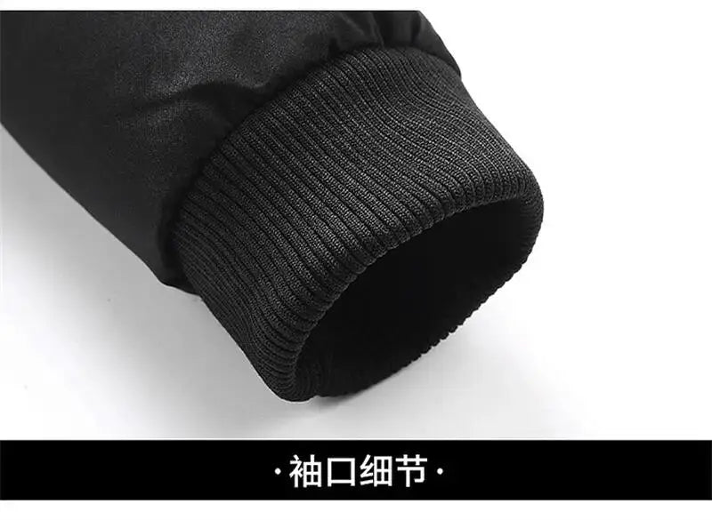 Men's black puffer jacket sleeve cuff with ribbed knit finish