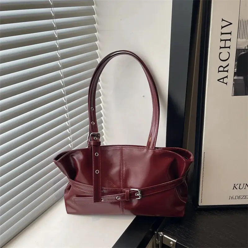 Simples Market burgundy soft leather belt-buckle handbag, Korean style, with shoulder strap