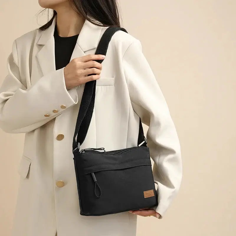 Simples Market 3 Main Pockets canvas crossbody bag, black multi-pocket purse with adjustable shoulder strap