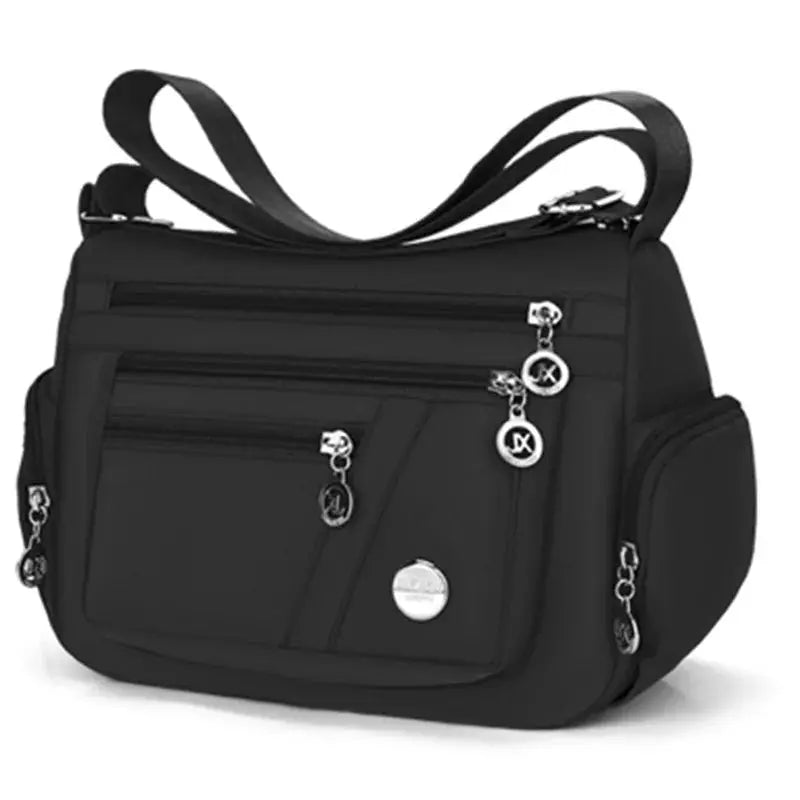 Simples Market black nylon crossbody handbag with multiple zip pockets and shoulder strap